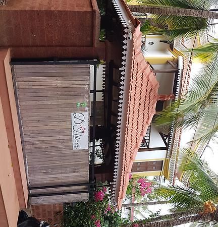 De Hibiscus Hotell Candolim Exteriör bild