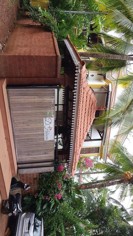 De Hibiscus Hotell Candolim Exteriör bild