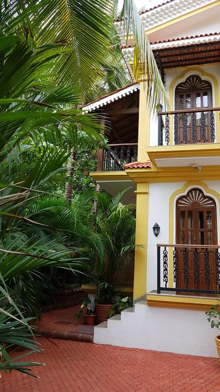 De Hibiscus Hotell Candolim Exteriör bild